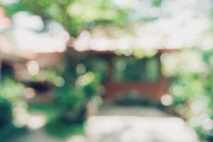 defocused bokeh and blur background of garden trees in sunlight. photo