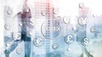 Forex trading currency exchange business finance diagrams dollar euro icons on blurred background. photo