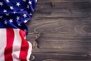 USA flag on wooden wall background and texture with space photo