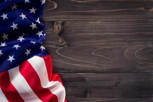 USA flag on wooden wall background and texture with space photo
