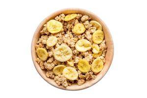 Close up top view granola in the bowl on isolated with clipping path. photo