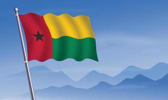 Guinea Bissau bandera con antecedentes de montañas y cielo vector