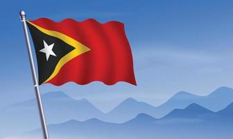 este Timor bandera con antecedentes de montañas y cielo vector