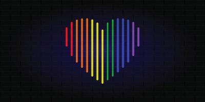 Neon glowing heart in the colors of the LGBT rainbow. Banner for LGBT Community Pride Month. Brick wall banner. Vector illustration