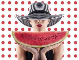 Girl in swimsuit with watermelon in hand and red circle background photo