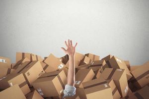 Man buried by a stack of cardboard boxes. 3D Rendering photo