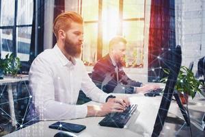 Businessperson in office connected on internet network. concept of partnership and teamwork photo