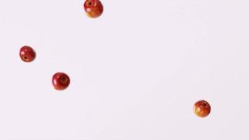 slow motion 3d animation video of apples falling from above