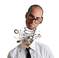 Stress and overwork concept. Explosion of a head of a businessman photo