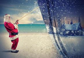 Santa Claus pulls the winter photo