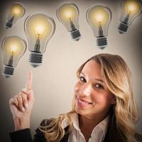 Businesswoman with lots of ideas photo