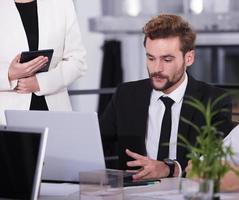 Businessperson in office connected on internet network. concept of partnership and teamwork photo