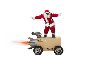 Sants Claus and super fast delivery of package service with box like a rocket. photo