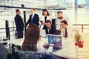 Businessperson in office connected on internet network. concept of partnership and teamwork photo