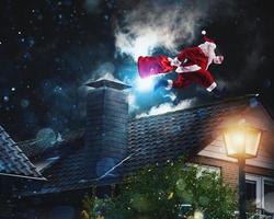 Santa claus ready to deliver presents for christmas photo