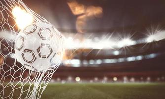 Soccer ball scores a goal on the net. 3D Rendering photo