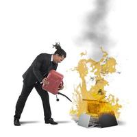 Businessman burns computers photo