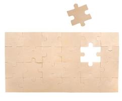 Puzzle wall with missing piece. concept teamwork, partnership, integration photo