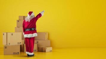 Santa Claus in front of cardboard boxes that indicates something in the wall photo