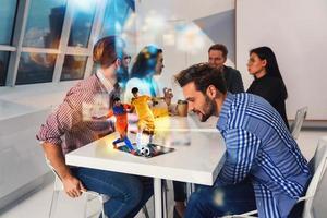 Friends watch a soccer match via internet streaming service photo