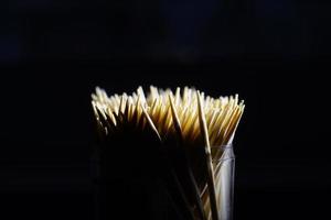 Toothpicks in black background. Macro shot of Toothpicks. Close up. Isolated photo