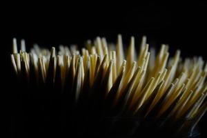 Macro shot of Toothpicks. Toothpicks in black background. Close up. Isolated photo