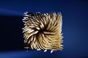 Top view of Toothpicks in blue background. Macro shot of Toothpicks. Close up. Isolated photo