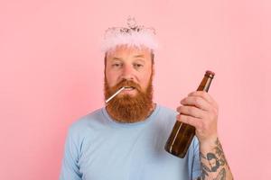 man with beard and tattoos acts like a princess of a tale photo