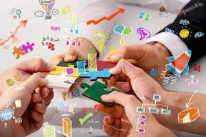 Teamwork of partners connect puzzle pieces as integration and startup photo