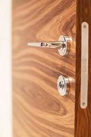 interior wooden door with a handle close photo
