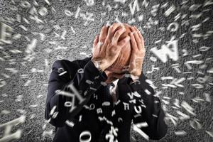 Businessman stunned by strong headache photo