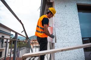 Polystyrene thermal cladding for energy saving on a construction site photo