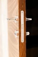 interior wooden door with a handle close photo