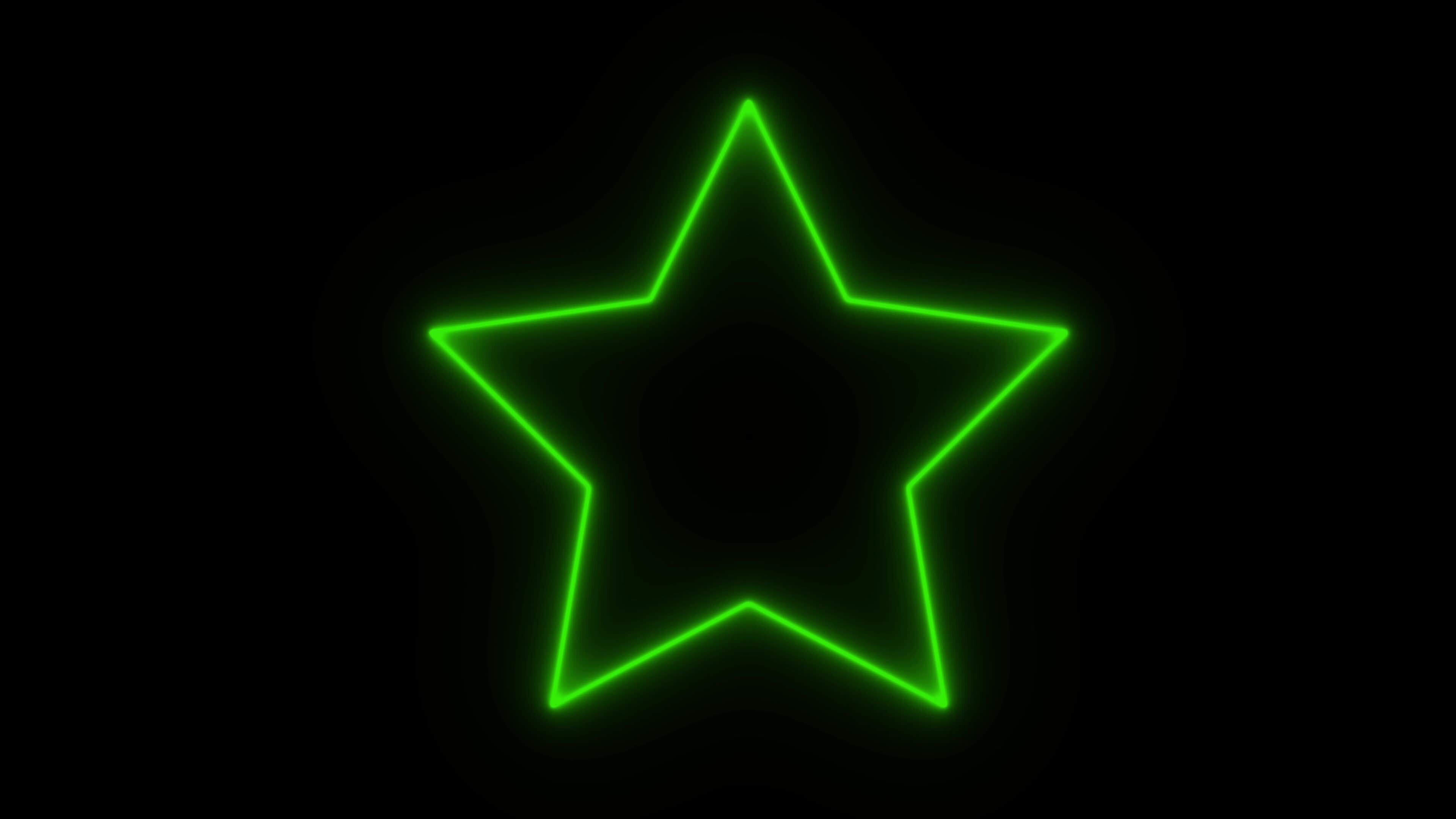 Animated green neon star flashing on black background 20734004 Stock