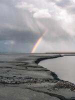 after the rain a beautiful rainbow appears photo