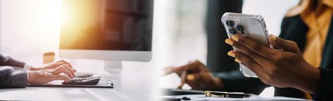 Team Of Business working at office with documents on his desk, doing planning analyzing the financial report, business plan investment, finance analysis concept photo