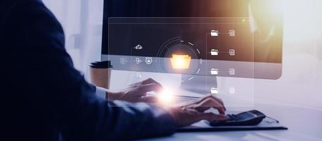 Document management system concept, business man holding folder and document icon software, searching and managing files online document database, for efficient archiving and company data. photo