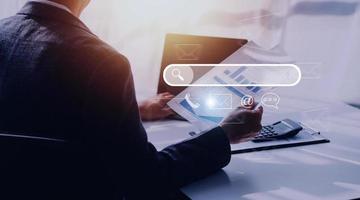 Search engine optimization, SEO, Searching Browsing Internet Data Information Networking Concept, Businessman use smartphone for find data on networking, copy space. photo