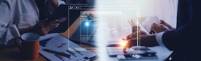 Project manager working with Gantt chart schedule to plan tasks and deliverables. Scheduling activities with a planning software, Corporate strategy for finance, operations, sales, marketing. photo