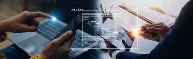 Project manager working with Gantt chart schedule to plan tasks and deliverables. Scheduling activities with a planning software, Corporate strategy for finance, operations, sales, marketing. photo