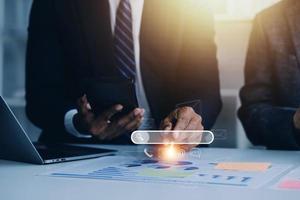 Search engine optimization, SEO, Searching Browsing Internet Data Information Networking Concept, Businessman use smartphone for find data on networking, copy space. photo