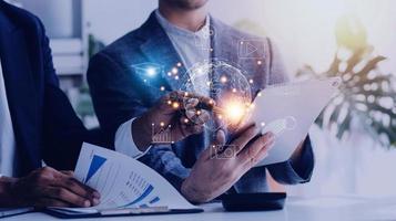 man wearing VR glasses and accessing the Technology Internet, multimedia, Storage Network connection Concept And a large database big data Through internet technology. photo