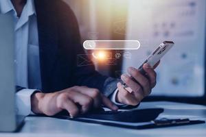 Search engine optimization, SEO, Searching Browsing Internet Data Information Networking Concept, Businessman use smartphone for find data on networking, copy space. photo