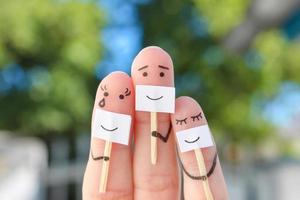 Fingers art of family. Concept of people hiding emotions. photo