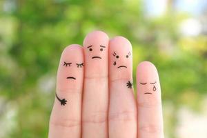 Fingers art of sad family. Concept of support in difficult situations. photo