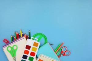 Stationery objects. School supplie. Top view. photo