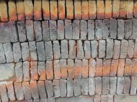 bricks that have been fired and stacked. photo