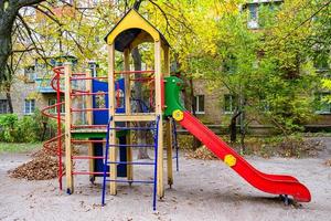 Photography on theme empty playground with metal slide for kids photo