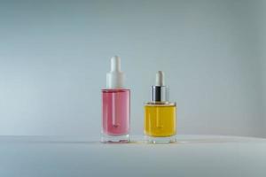 pink and yellow face and hair oils photo