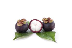 Whole and cut half Mangosteen with leaf is the queen of fruits isolated on white background. Sweet taste delicious. photo